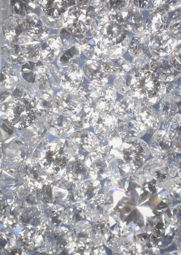 Dazzling cluster of sparkling diamonds with brilliant facets on elegant silver and white background Wallpaper