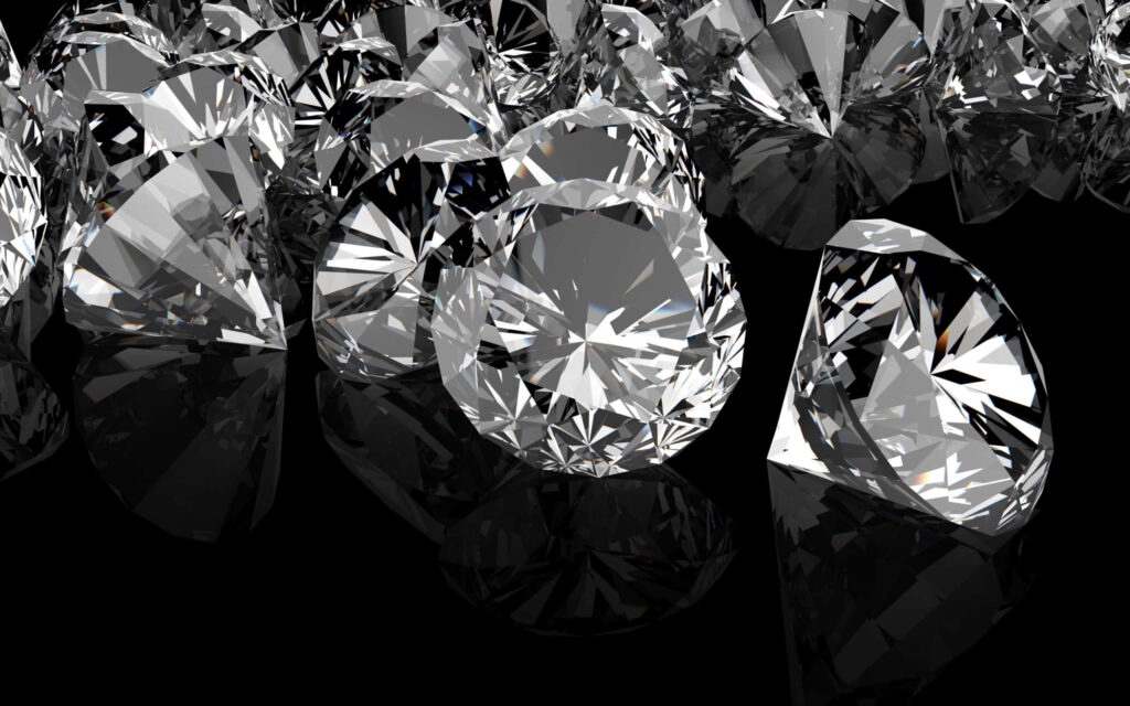 Dazzling Brilliance: The Radiant Diamond Against a Moody Grey Setting Wallpaper