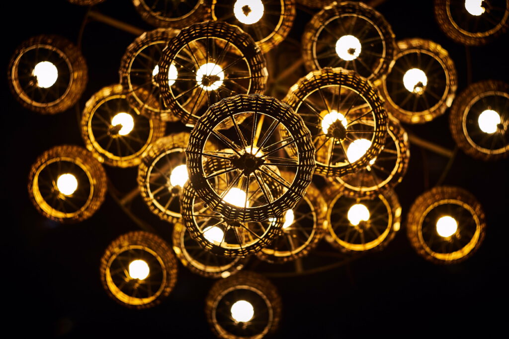 Luminous Ambiance: Mesmerizing Chandelier Illuminates with Radiant Glow in Stunning 4K Wallpaper