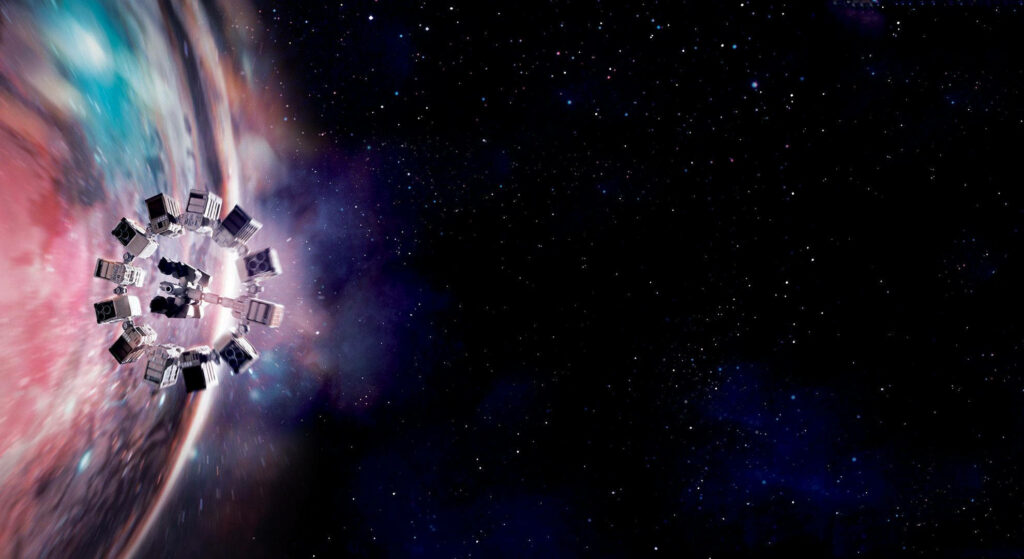 Endurance Beyond the Stars: Enchanting Interstellar Planet Embodied in Radiant Pink Hues Wallpaper