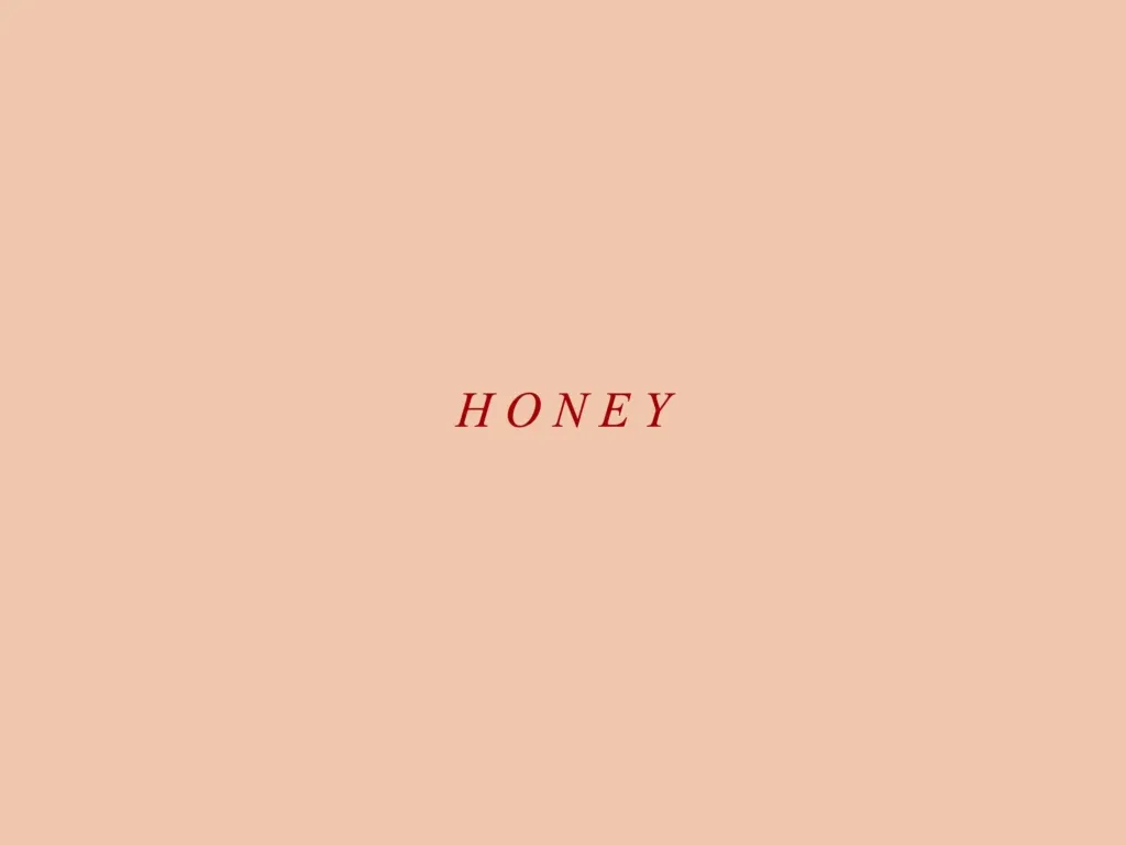 HONEY word on cozy peach background with minimalist vibe Wallpaper