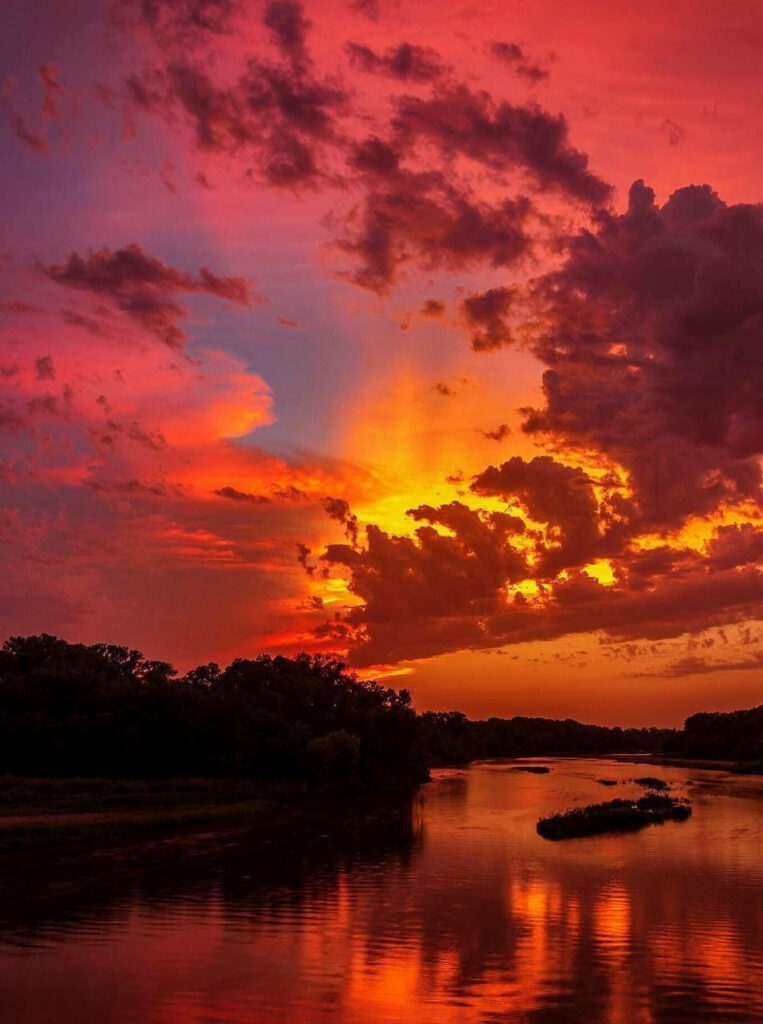 The Enchanting Orange Horizon: Captivating Aesthetic Sunset Reflection on the Lake Shore Wallpaper