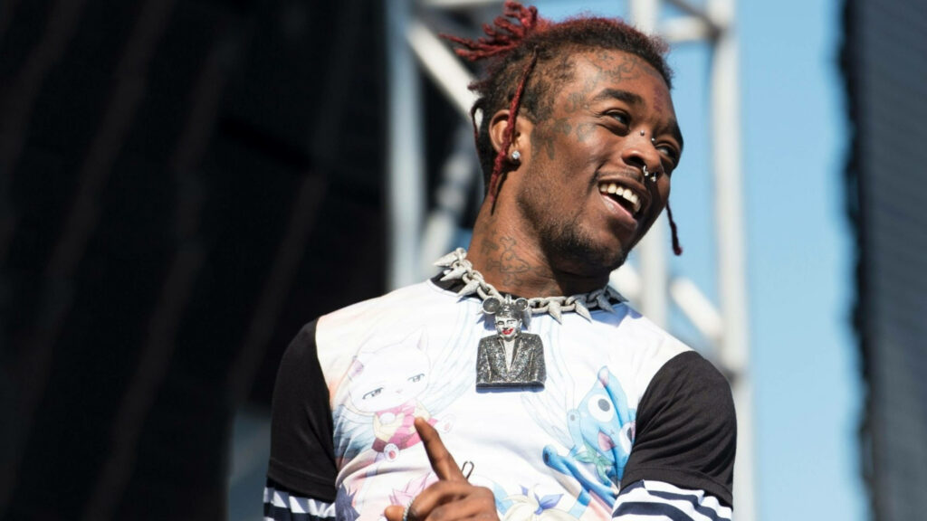Lil Uzi Vert Radiating Joy: A Resilient Rapper Embracing Happiness amidst Challenges - Background Wallpaper