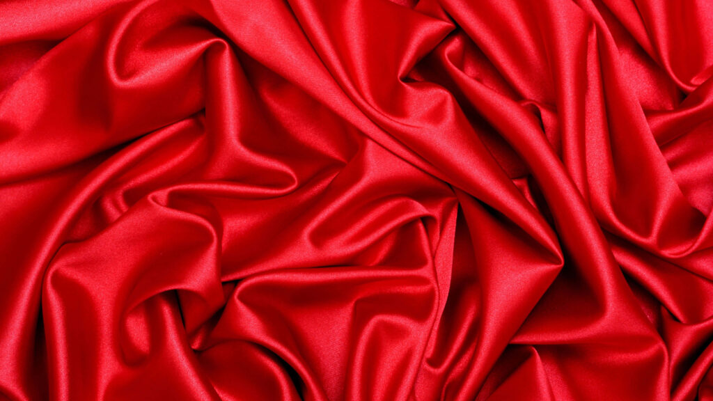 Folded Elegance: Captivating Red Fabric Texture for Enchanting Desktop Backgrounds Wallpaper