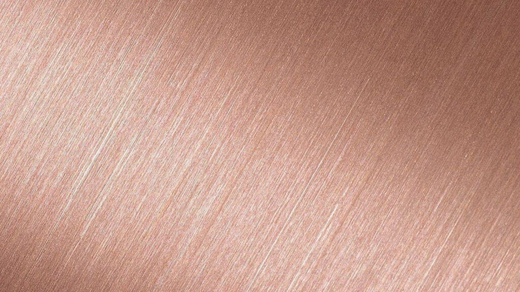 Rose gold brushed metal texture wallpaper with soft sheen and fine diagonal brush strokes background