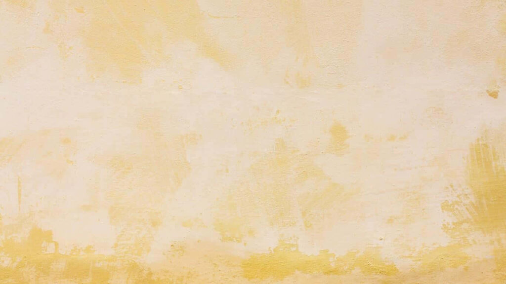 Radiant Grunge: A Captivating Light Yellow Wallpaper for Your Background Photo