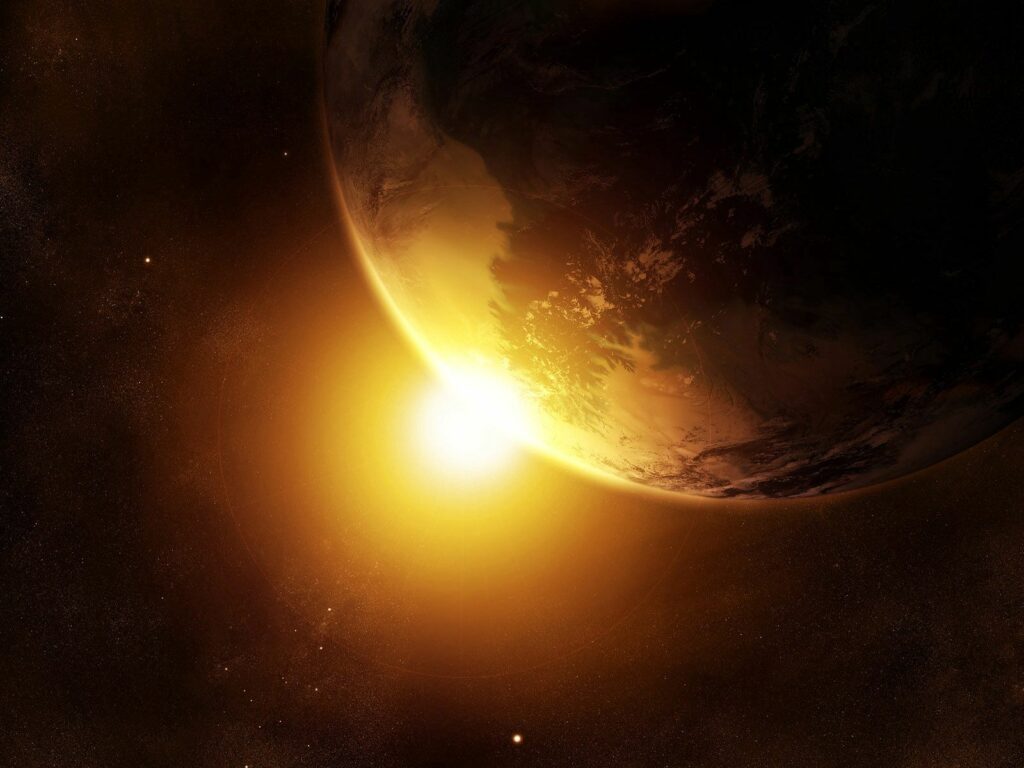 Stunning Space Wallpaper: Planet in Radiant Golden Light | 1600x1200