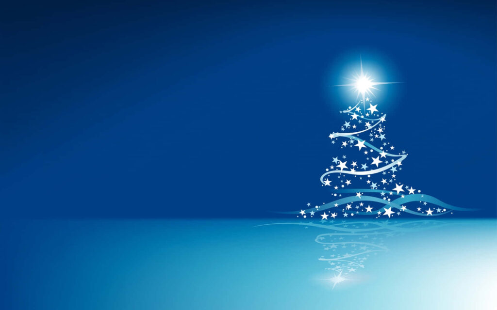 Radiant Star Christmas Tree Wallpaper on Serene Blue Background