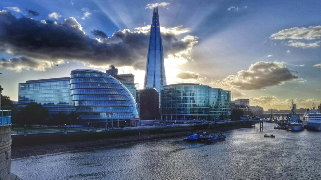 Radiant Shard Wallpaper: Sunlit London Architecture & Serene Riverscape