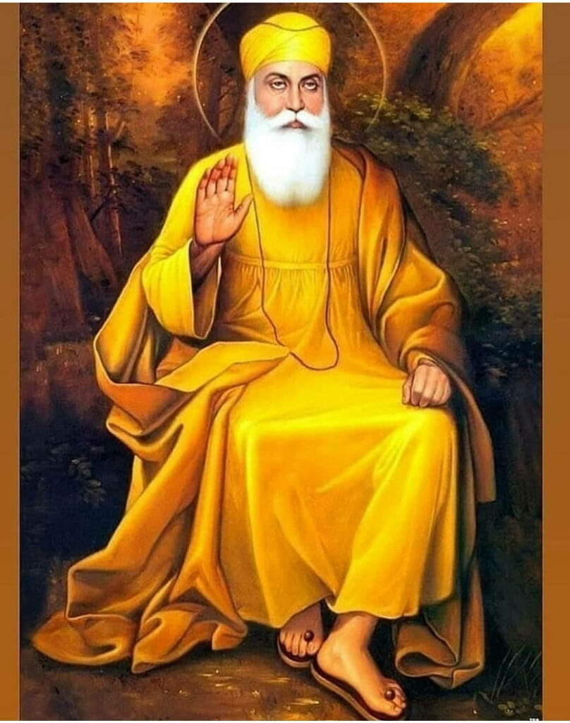 The Radiant Vision: Waheguru Nanak Dev Ji's Golden Attire amidst a Serene Forest Wallpaper
