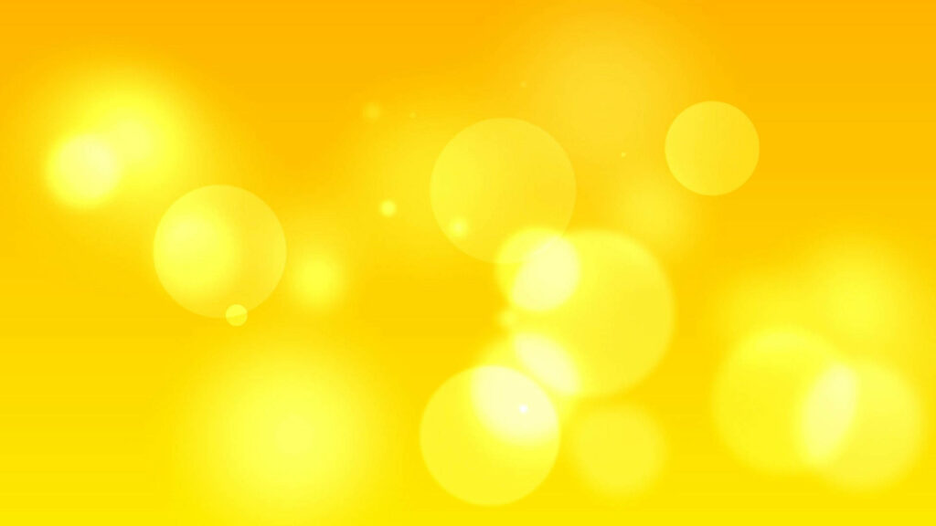 Glowing Yellow Bokeh: A Stunning HD Wallpaper with Abstract Patterns