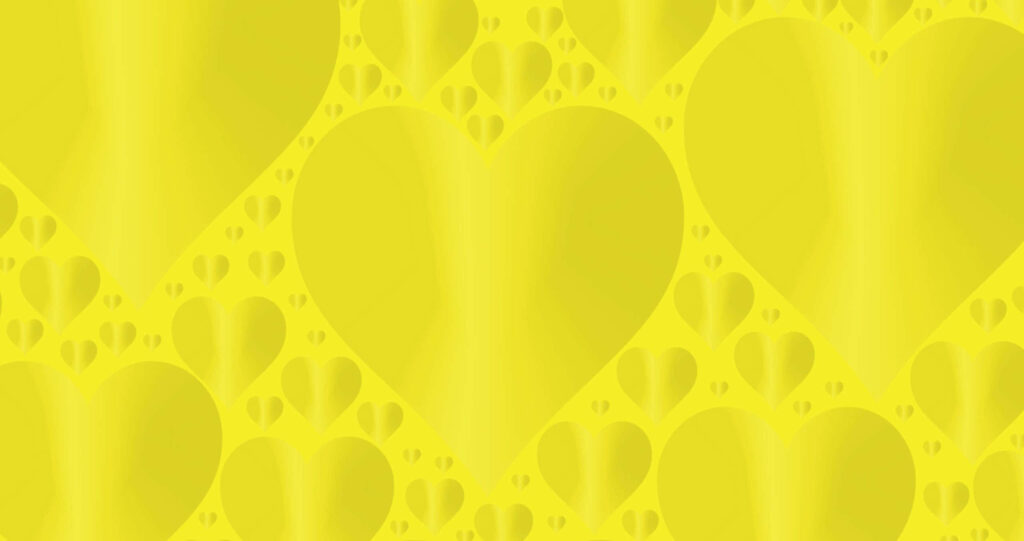 Radiant Yellow Heart Wallpaper - Warm & Cheerful Background Design