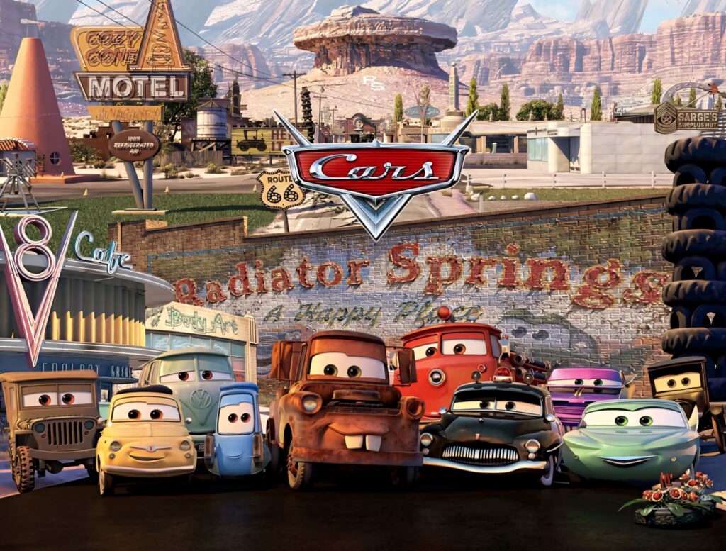 Cars animated movie wallpaper with Lightning McQueen and friends in Radiator Springs scene