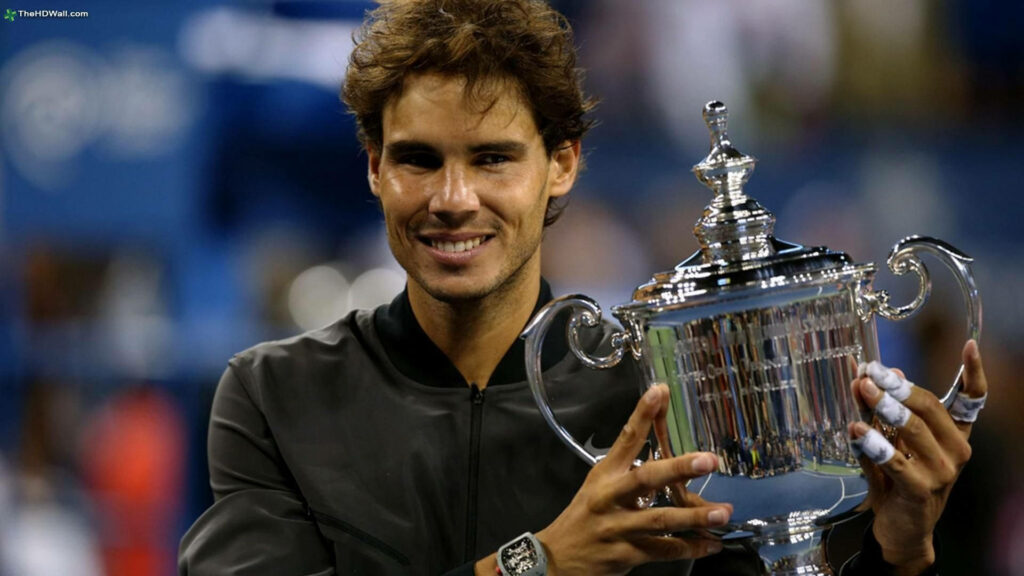 Rafael Nadal Celebrates US Open Victory with Trophy - Wallpaper Background