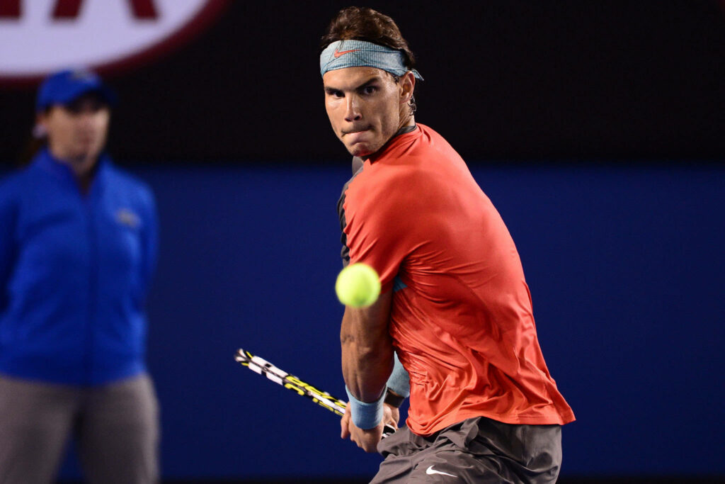 Rafael Nadal Intense Focus: Dynamic Wallpaper Background of Determination
