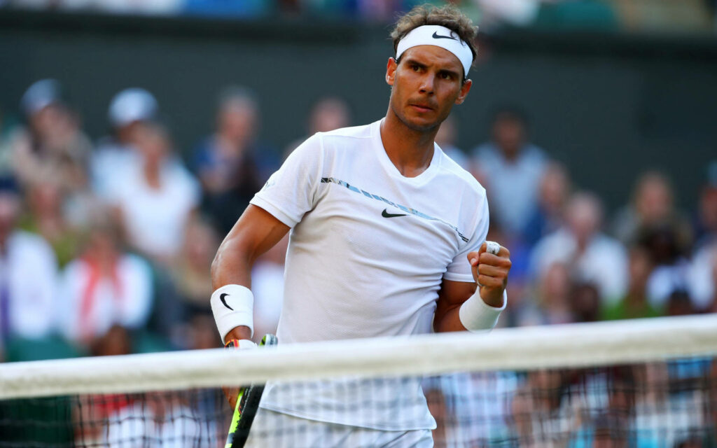 Rafael Nadal: Intense Tennis Match Wallpaper Background