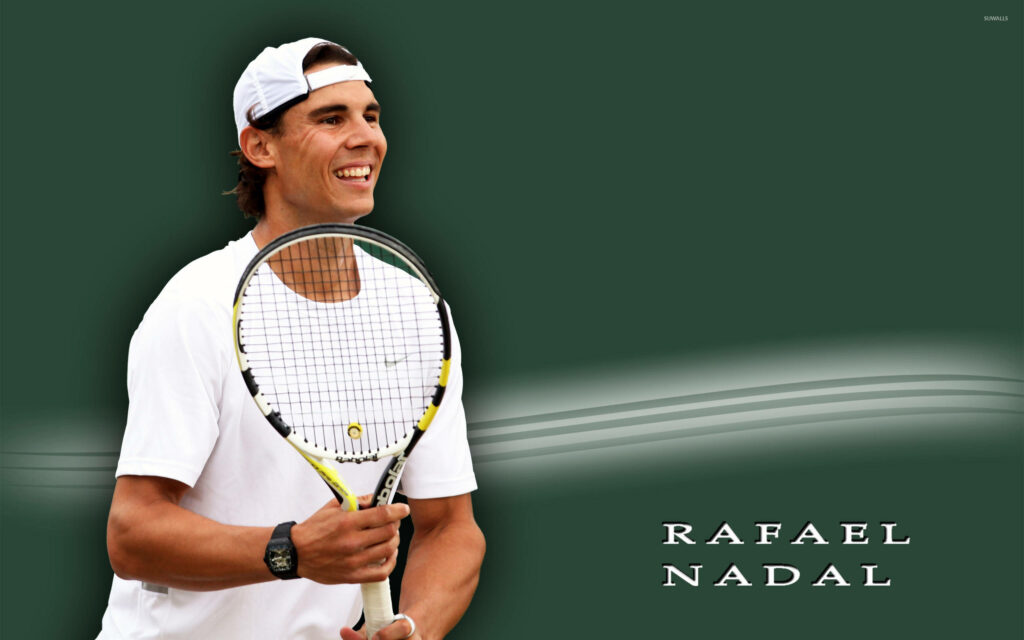 Rafael Nadal Wallpaper: Cheerful Tennis Star on Green Background