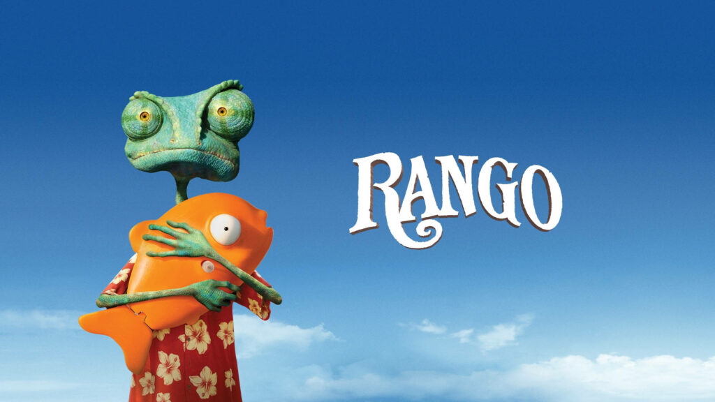 The Courageous Chameleon: Rango Strikes a Pose Against a Majestic Desert Landscape Wallpaper