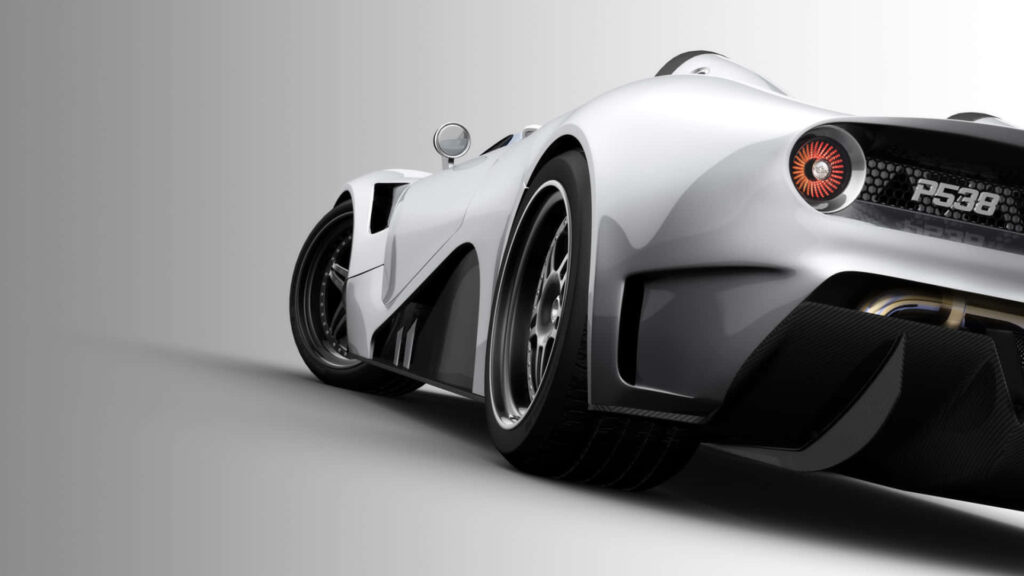 Rare silver sports car low rear view sleek aerodynamic design bold alloy wheels wallpaper