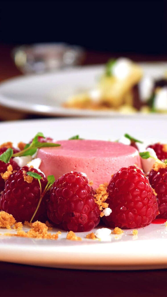 Panna Cotta Delight: A Raspberry Symphony in an Android Dessert Wonderland Wallpaper