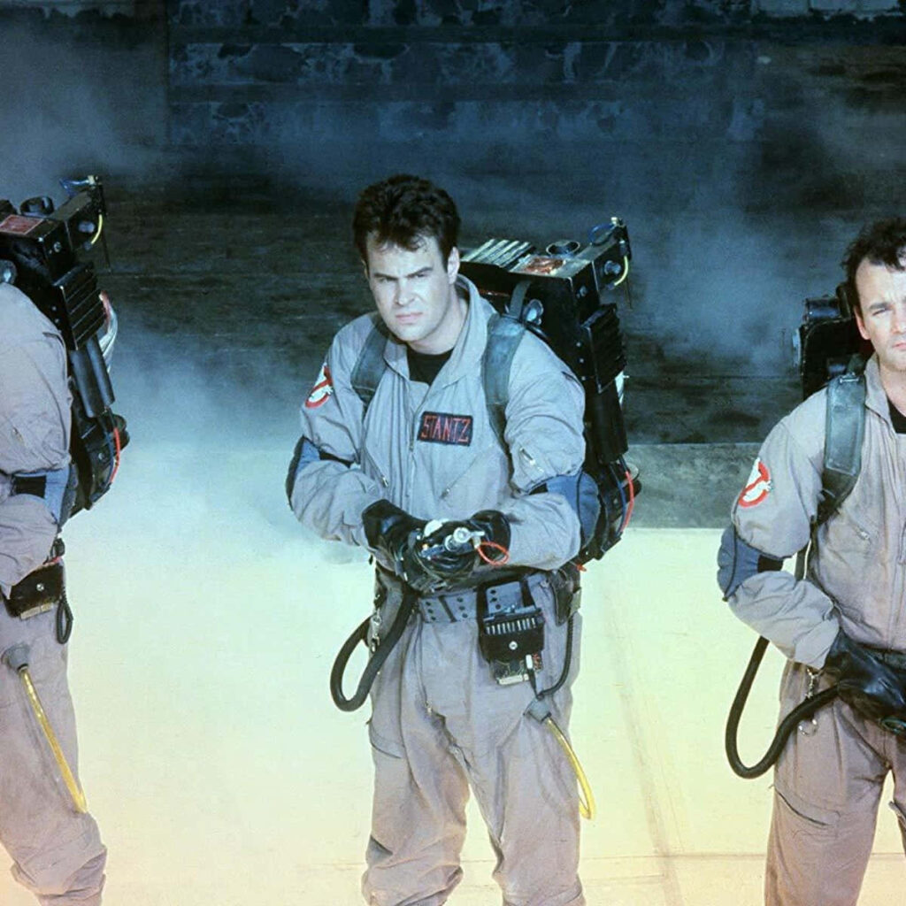 Dan Aykroyd as Ray Stantz Ghostbusters beige jumpsuit proton pack misty cinematic wallpaper