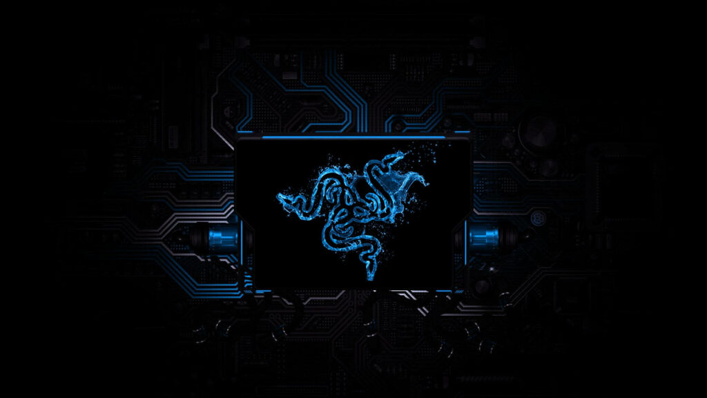 Immersive Razer PC Display: Cutting-Edge Technological Setup with Striking Blue Logo Wallpaper