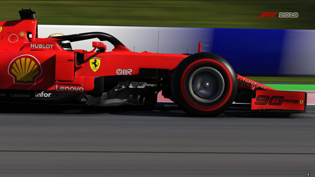 Dominating the Racetrack: Scuderia Ferrari's Cutting-Edge F1 Racer Aims to Conquer 2019 Championships Wallpaper
