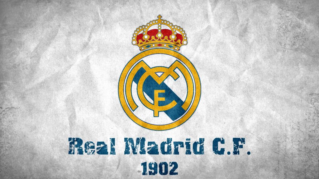 Real Madrid CF wallpaper with gold blue crest crown textured gray background 1902 text