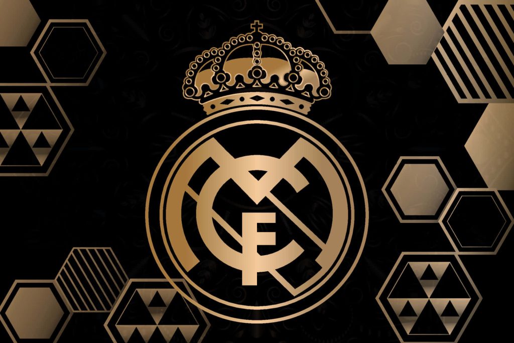 Real Madrid gold crest on black hexagonal background elegant soccer wallpaper design