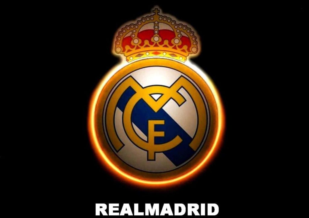 Real Madrid logo glowing gold on black background sleek high contrast football wallpaper