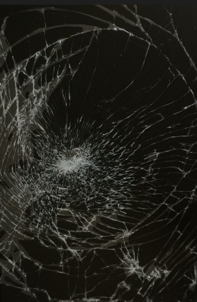 Realistic shattered glass computer screen wallpaper with spiderweb cracks and central impact point