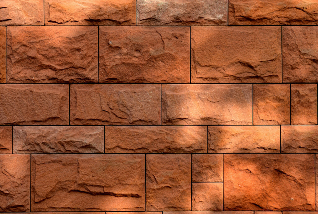 Realistic Textured Brown Brick Wall Wallpaper Background Design