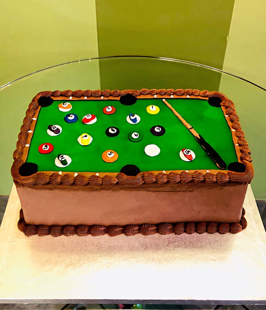 Realistic pool table cake with green icing colorful balls and fondant pool cue wallpaper background