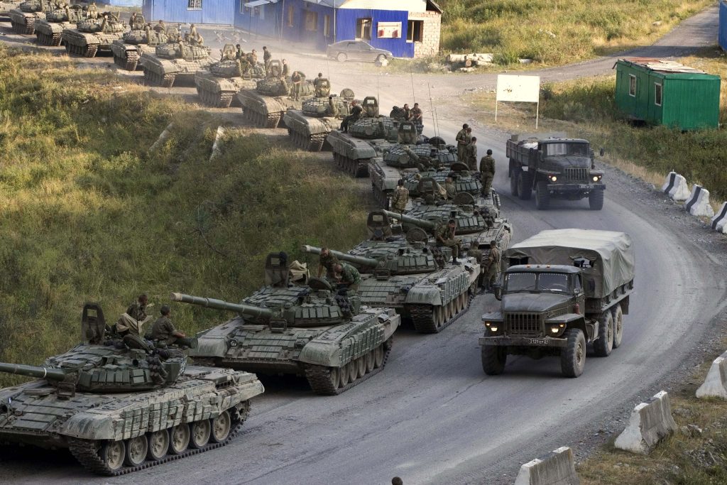 Russian T72 tanks and military convoy moving on rural road tactical armored vehicles wallpaper