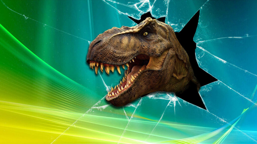 Realistic T-Rex dinosaur bursting through cracked computer screen with vibrant 3D effects wallpaper