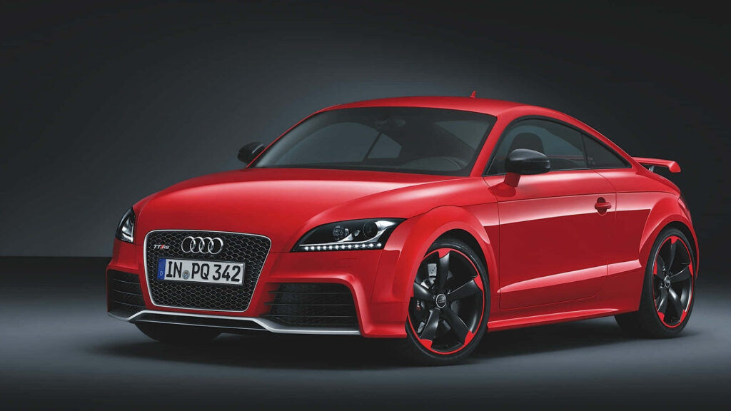 Red Audi sports car with aggressive styling and modern design sports wallpaper background