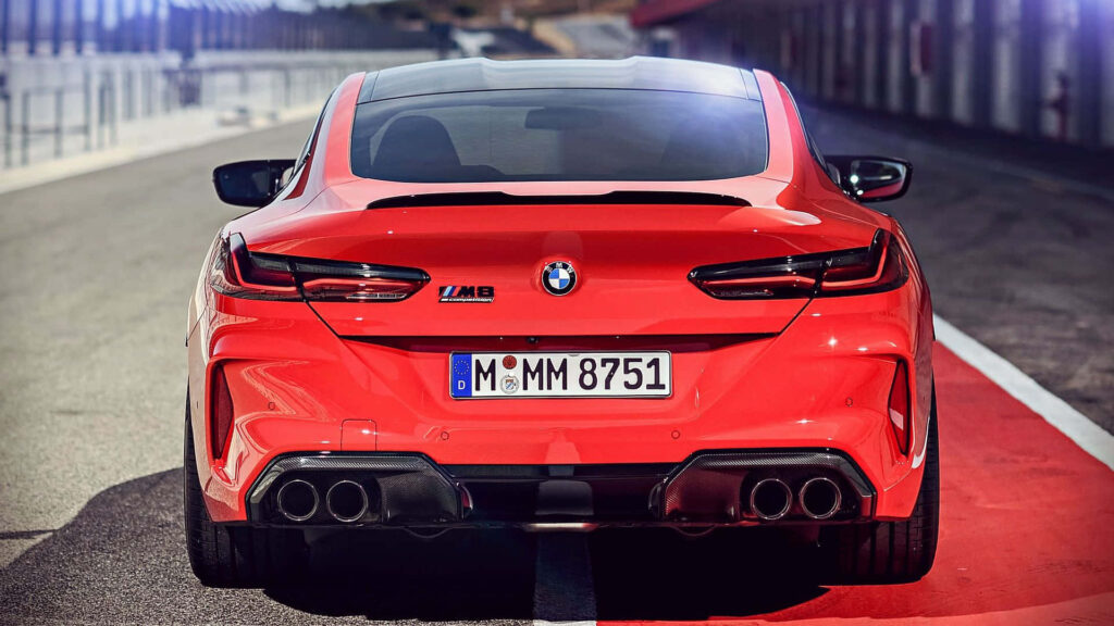 Crimson Speed: Mesmerizing 4k Wall Art of BMW M8 Model in Dynamic Setting Wallpaper