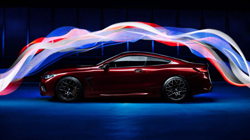 Vibrant Waves of Patriotism Embrace Dazzling Red BMW M8 in Stunning 1920x1080 Backdrop Wallpaper