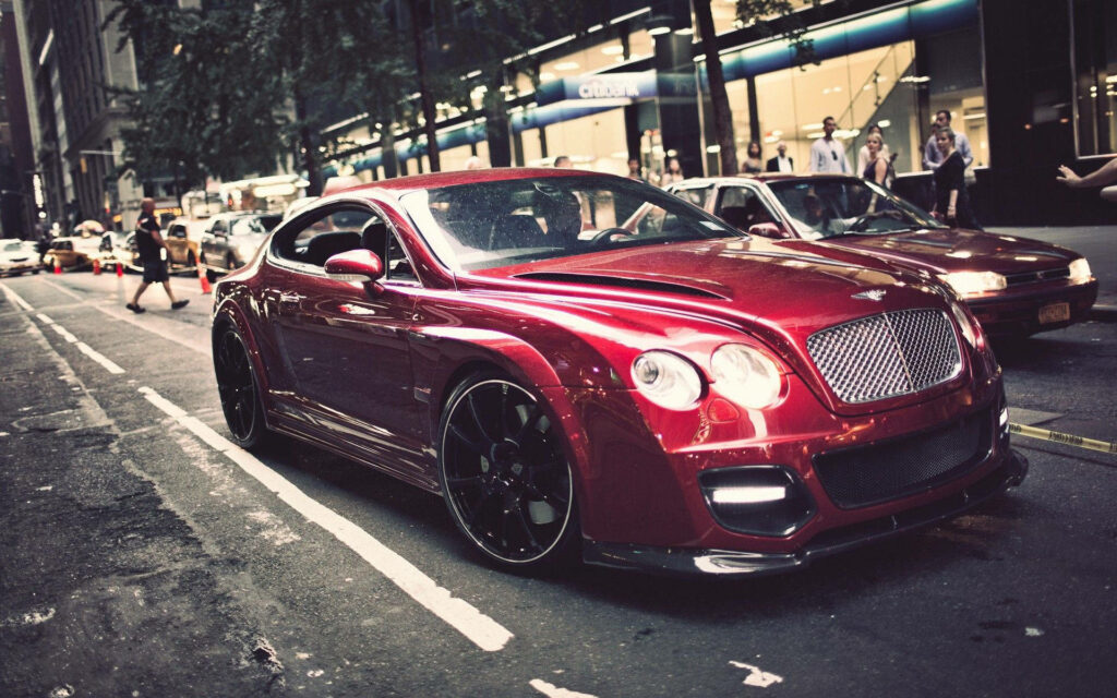 Red Bentley Roaming the Streets - Captivating Wallpaper and Captivating Image