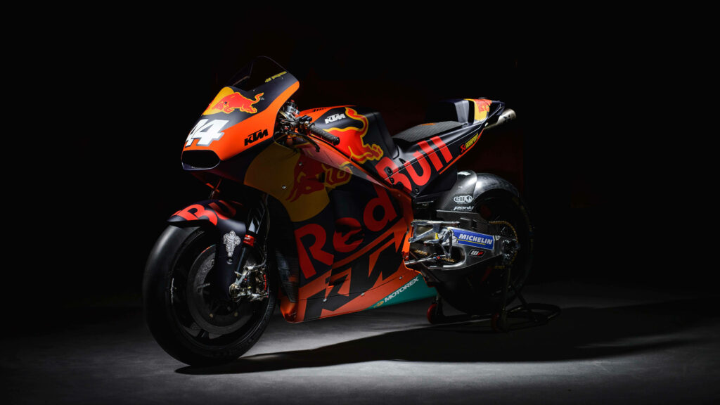 Red Bull-Infused KTM Bike Captured in Mesmerizing Spotlight - 4K Wallpaper
