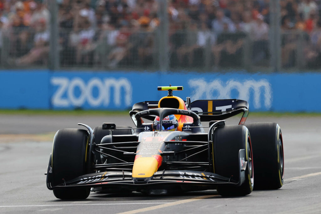 Red Bull Racing Formula 1 car speeding on track showing precision and thrilling race action wallpaper