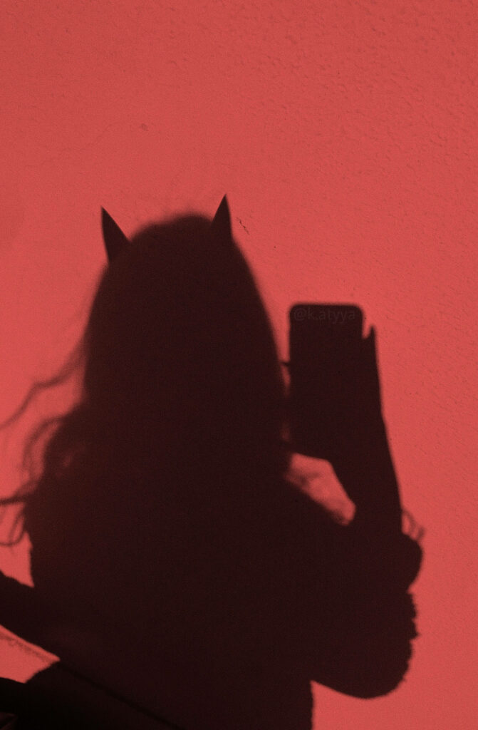 Red Hot Baddie: Devil Girl Silhouette Wallpaper for Your Devilishly Cool Devices