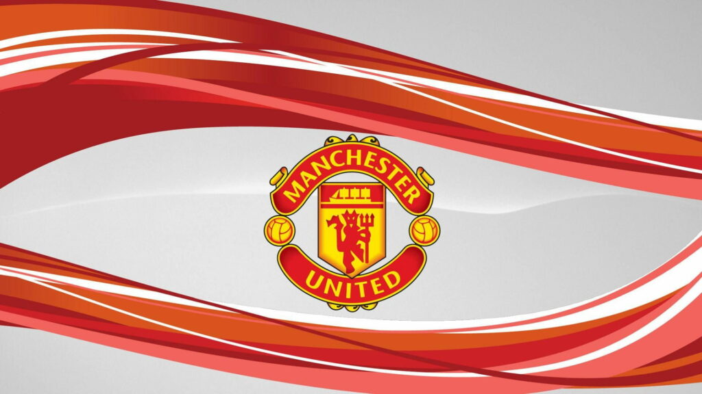 Red Devils Reign: The Iconic Manchester United Logo in High-Definition Wallpaper