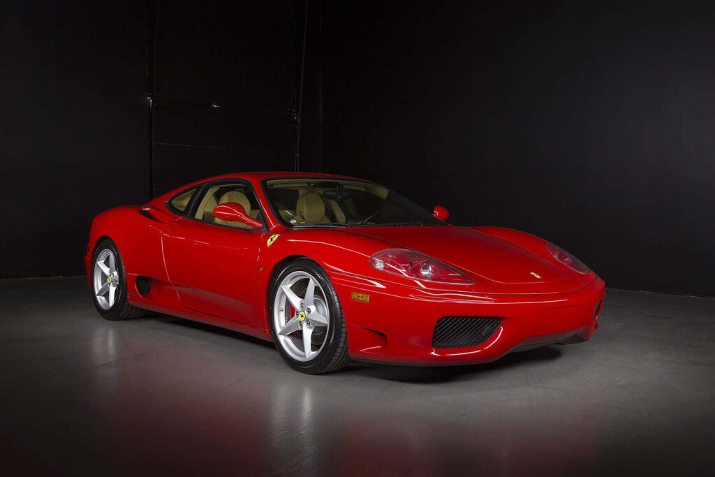 Red Ferrari 360 Modena in a Dark Background Wallpaper