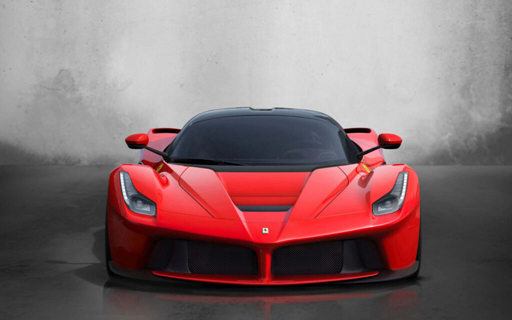 3D render of sleek red Ferrari front design with aerodynamic curves on minimalist background Wallpaper