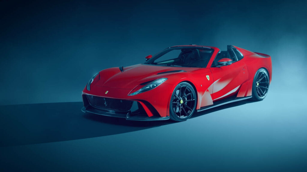 Red Ferrari 812 Superfast open-top sports car with sleek design on dramatic blue background wallpaper