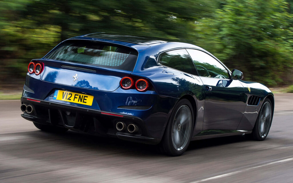 Blue Ferrari GTC4Lusso on a Road background Wallpaper