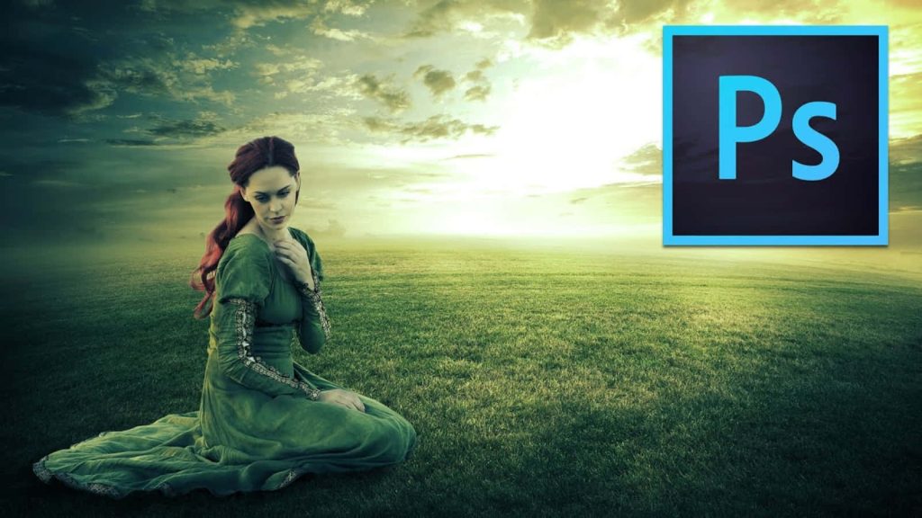 Woman with red hair in medieval green gown kneeling in sunset field fantasy wallpaper background