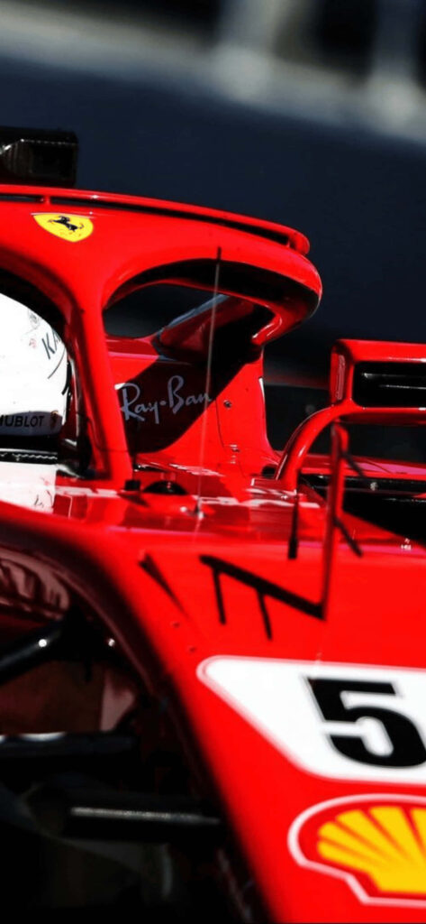 Crimson Speed: Ferrari's Fiery Icon Takes Center Stage in F1 2018 Close-Up Wallpaper