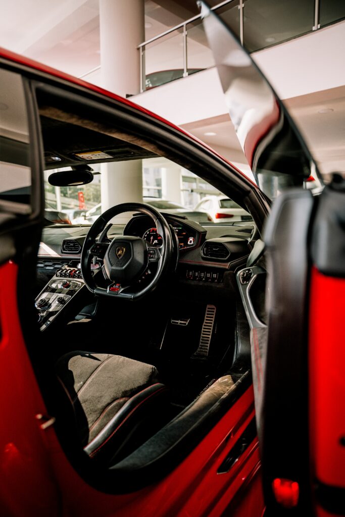 Luxurious Red Lamborghini Interior Wallpaper: Sleek Design & Details